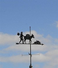 The Pinnacle of the "Key" With a Weather Vane