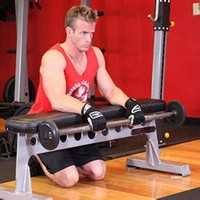 Palms-Down Wrist Curl Over A Bench