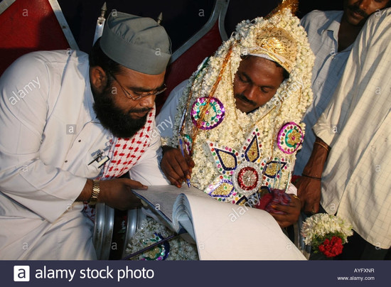 Muslim groom signs Nikaahnaama ( marriage certificate ...