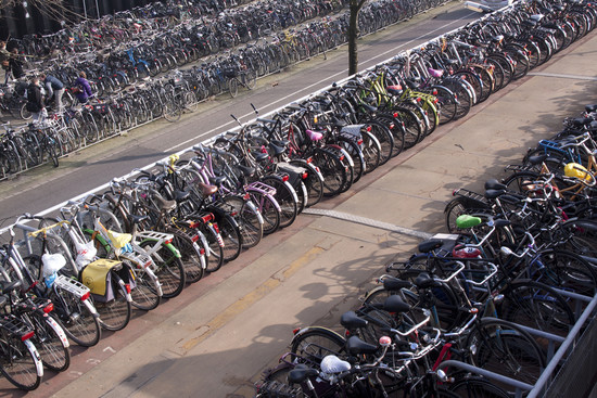 Amsterdam is out of bicycle parking spaces, so it's ...