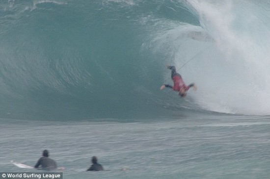 Is he checking for sharks? Surfers suffer bone-crunching ...