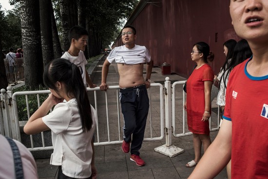 How Some Chinese Men Meet Summer’s Swelter: With Midriff ...
